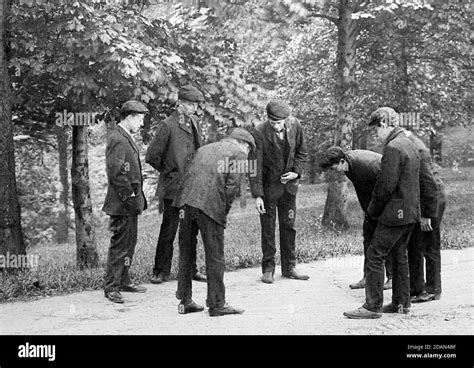 Pitch and Toss gambling game, Victorian period Stock Photo - Alamy