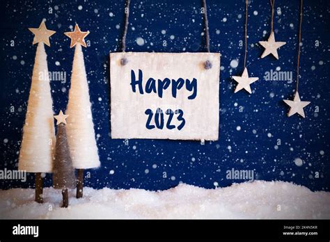 Christmas Tree, Blue Background, Snow, Text Happy 2023, Snowflakes Stock Photo - Alamy