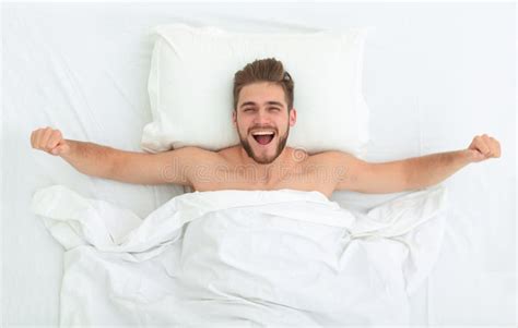 Top View. Happy Man Waking Up in a Comfortable Bed Stock Image - Image ...