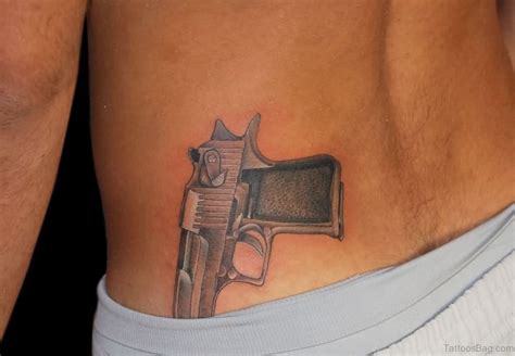 71 Stylish Gun Tattoos For Waist - Tattoo Designs – TattoosBag.com