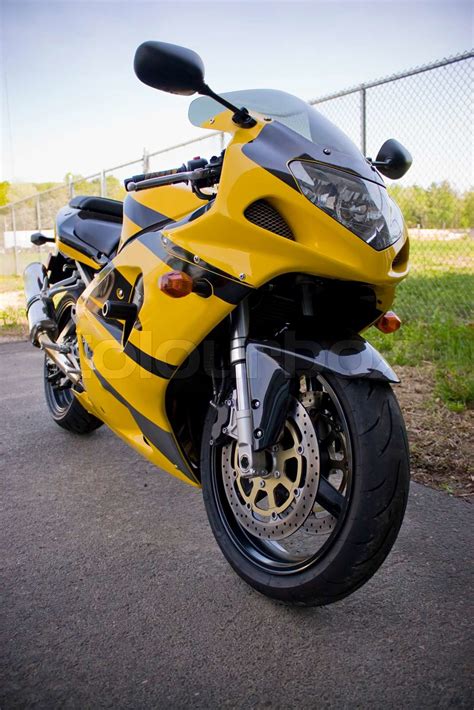 A brand new yellow motorcycle - modern day crotch rocket | Stock image ...