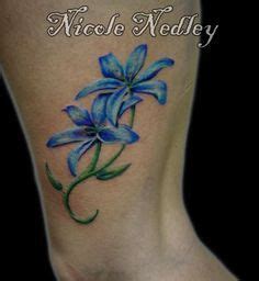 26 Blue Water Lily Flower Tattoo Designs ideas | lily flower tattoos, flower tattoo designs ...