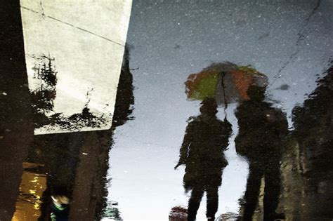 Beautiful Rainy Day Reflections Captured on City Streets | Water reflection photography ...