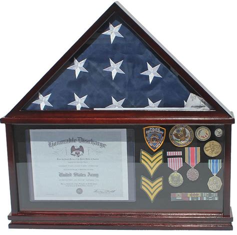 an american flag and medal display in a wooden frame with white stars on the top