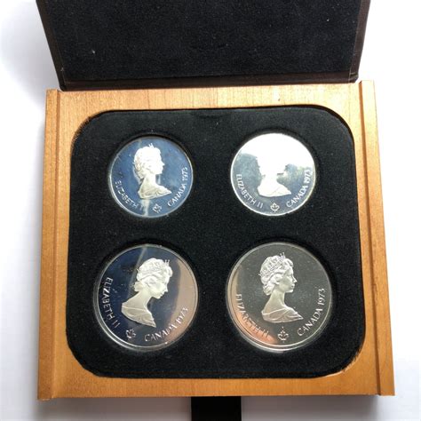 Canada Olympic Silver Commemorative Coins in Wood Box | Property Room