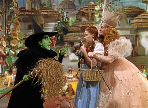 "The Wizard of Oz" movie still, 1939. L to R: Margaret Hamilton, Judy Garland, Billie Burke ...