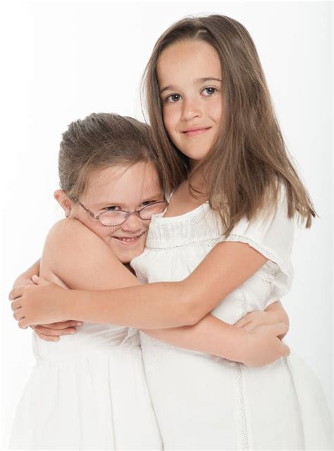 Sisters hug stock photo. Image of siblings, close, pretty - 62247508