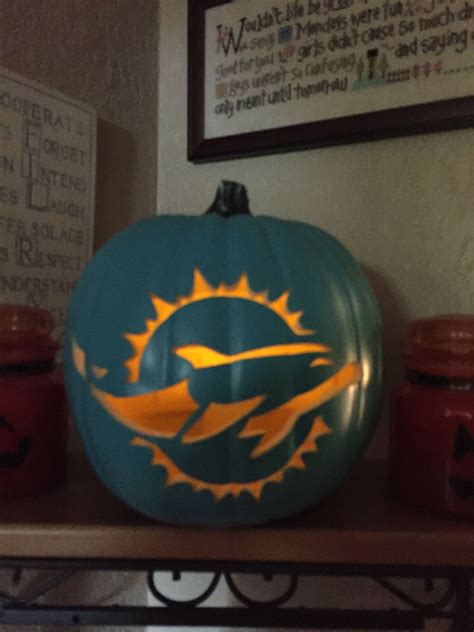 Miami Dolphin carved pumpkin | Pumpkin carving, Dolphin pumpkin carving, Halloween pumpkins carvings