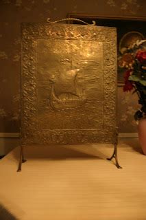 OBjECTS: Brass Repoussé Fireplace Screen with Viking Ship