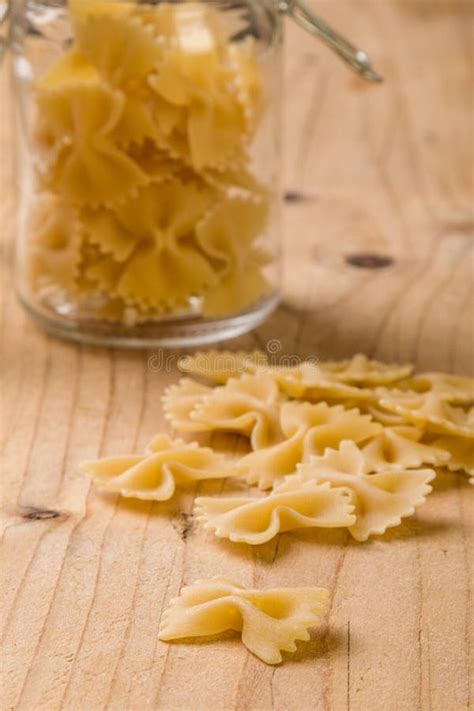 Raw farfalle bow-tie pasta stock photo. Image of pasta - 86015098