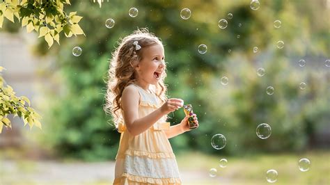 Smiling Little Girl Child Is Playing With Bubbles HD Cute Wallpapers | HD Wallpapers | ID #54738