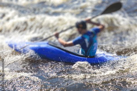 Kayak slalom canoe race in white water rapid river, process of kayaking ...