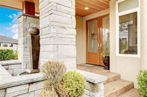 STONE PORCH COLUMNS AND FLOORING | PORCH AREA