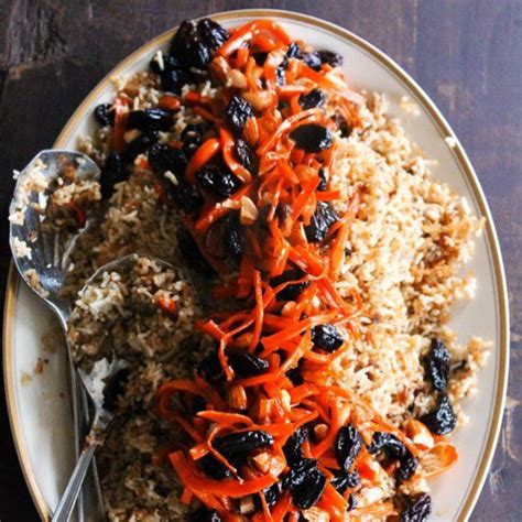 Qabili Palau, also known as Kabuli Palau, Afghanistan's national dish, is a gorgeous blend of ...