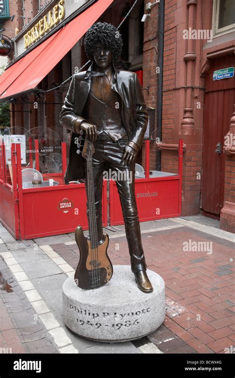 Statue of thin lizzy guitarist and singer phil lynott in dublin city ...