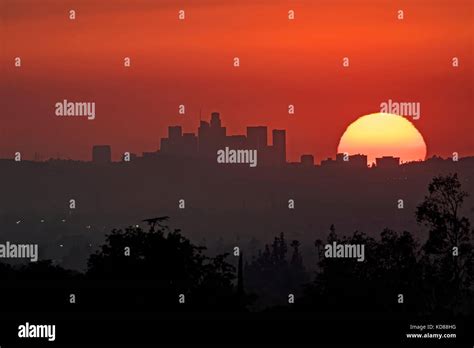 Sunset over Los Angeles city skyline Stock Photo - Alamy