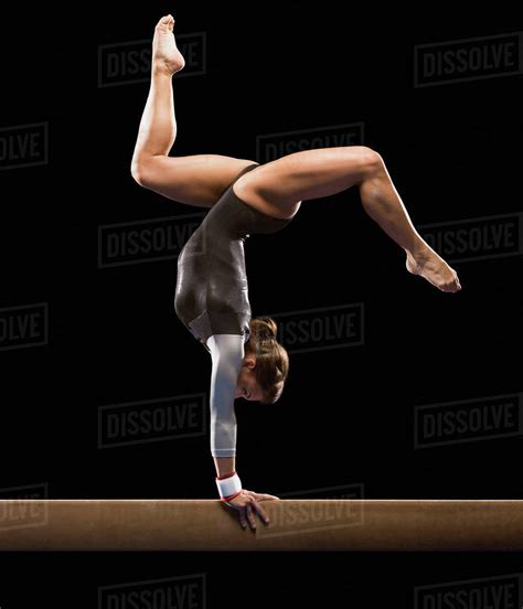 Gymnast on balance beam - Stock Photo - Dissolve