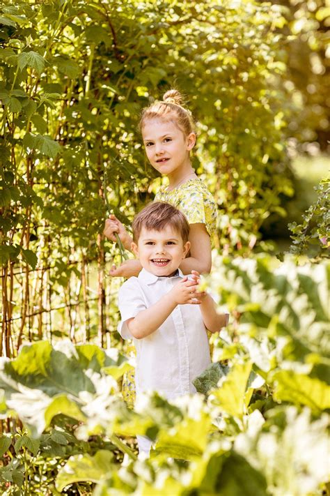 Princess Estelle and Prince Oscar posed for some new portraits that showed the siblings enjoying ...