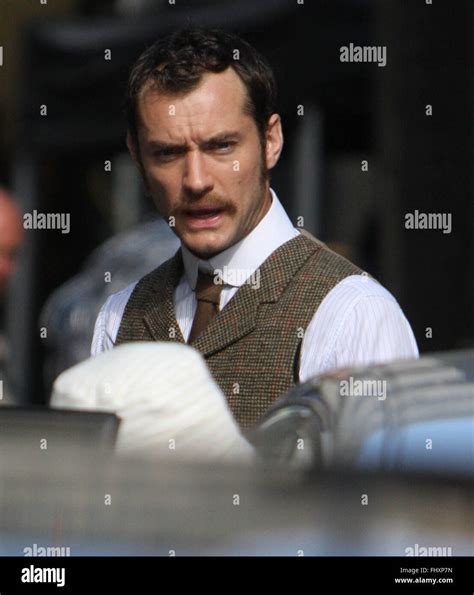 Jude Law as Dr watson on film set of Sherlock Holmes London Islington (credit image © Jack ...