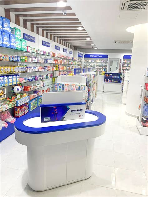 Modern Pharmacy Furniture Medical Shop Glass Wall Display Fixture Custom Pharmacy Wall Mounted ...