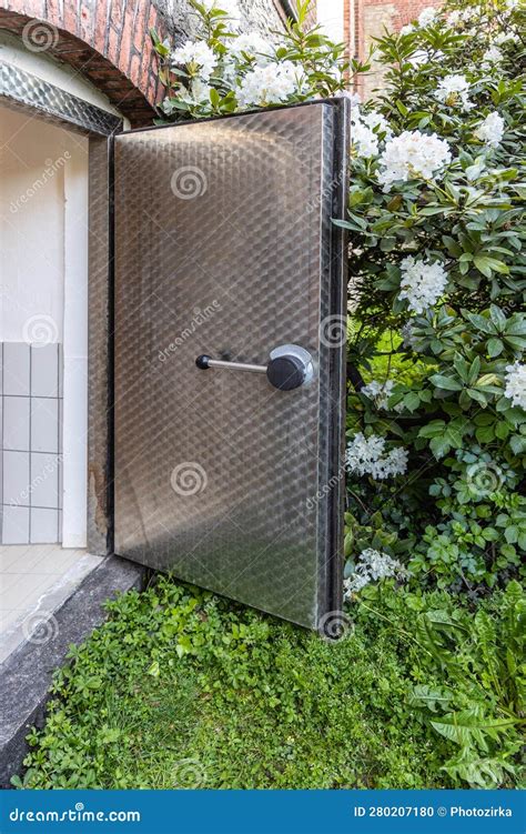 Metal Door To the Bomb Shelter Stock Photo - Image of exterior, blooming: 280207180