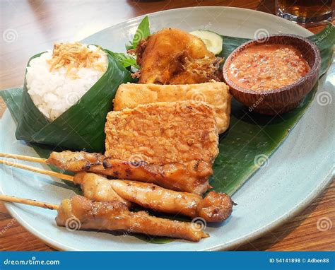 Nasi Uduk with Chicken Satay , Indonesian Dish Stock Photo - Image of seafood, retail: 54141898