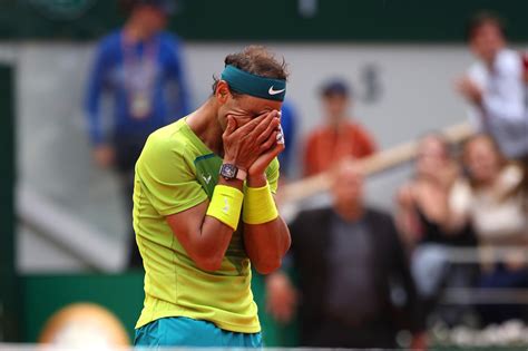 Rafael Nadal reacts after winning his 22 Grand Slam title (photos by ...