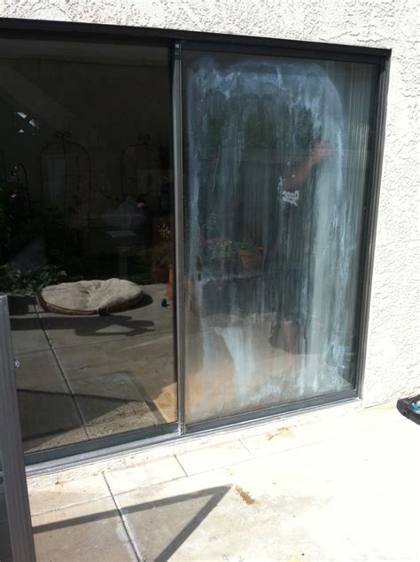 Glass Repair San Diego - Fogged Sliding Door - Before / After photo