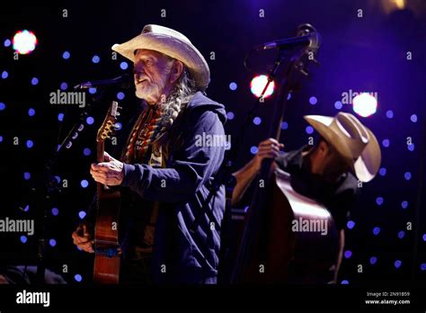 Willie Nelson performs during the Farm Aid 2012 concert at Hersheypark ...