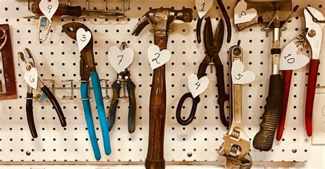 Handheld Tools Hang on Workbench · Free Stock Photo