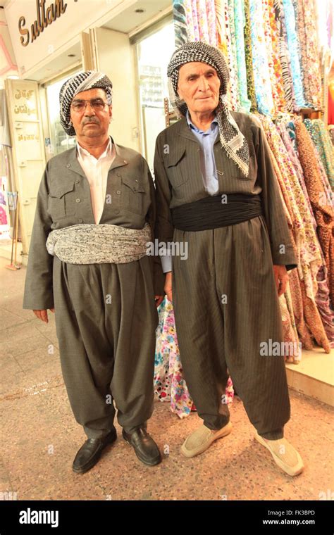 Kurdish men dressed in traditional clothes at Erbil bazaar Stock Photo ...