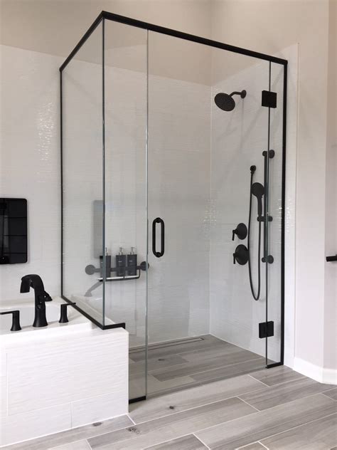 Custom frameless glass shower enclosure, matte black finish | Frameless ...