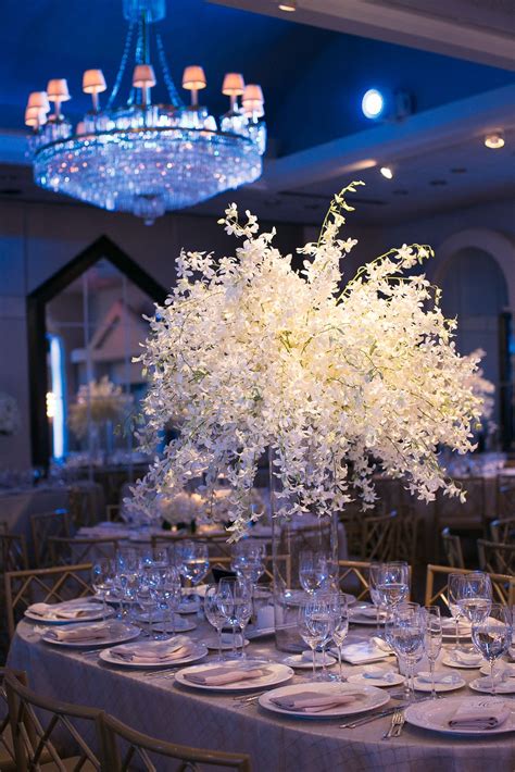 Large White Floral Centerpiece in Glass Vase | White floral centerpieces, Floral centerpieces ...