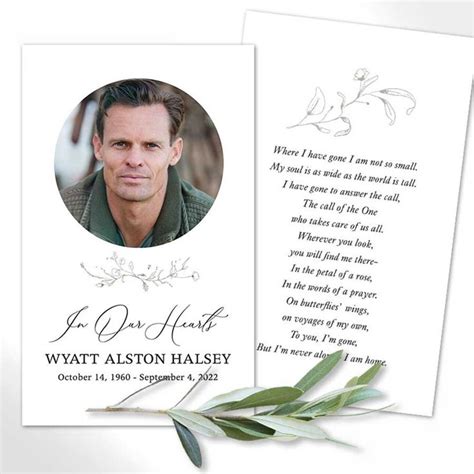 a funeral card with an image of a man