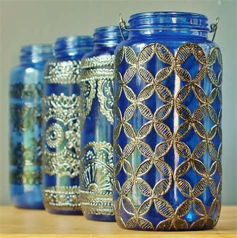 Pewter designs on glass jars | Knysna-Plett Herald