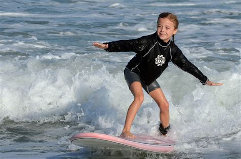 Free photo: Child surfing - Boy, Sun, Sea - Free Download - Jooinn