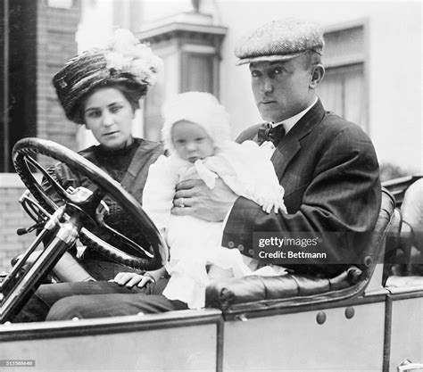 Mr. & Mrs. Ty Cobb and baby in Owen car. Ty is holding the child. News Photo - Getty Images