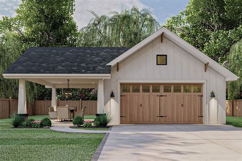 This is a single story Craftsman-style 2 car garage with a covered ...