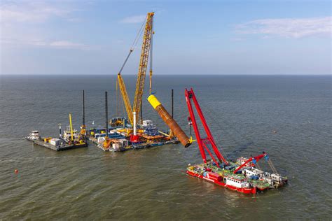 Floating crane Triton closely involved in construction of Fryslân Wind Farm