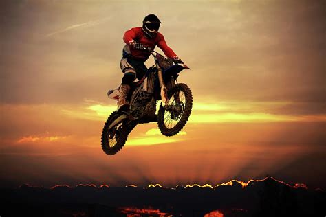 Biker On Motorcycle Jumping Over Clouds Photograph by Sergiy Trofimov Photography - Fine Art America