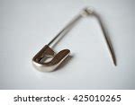 Free Image of Metal safety pin close up | Freebie.Photography