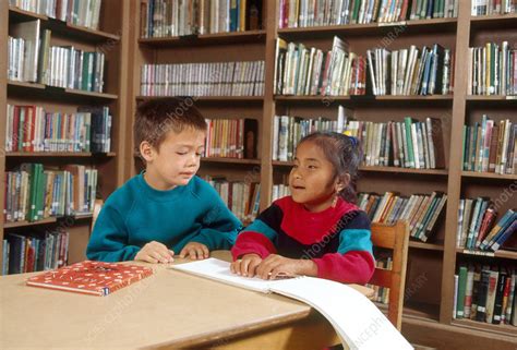 Blind Girl Reading Braille - Stock Image - C012/3950 - Science Photo Library