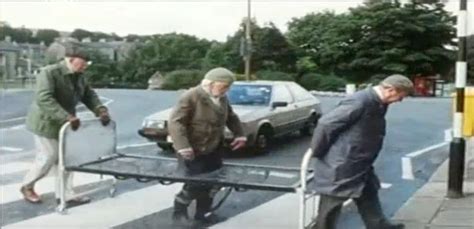 Trio up to their usual madcap antics in funny scene while trying to transport bed frame British ...