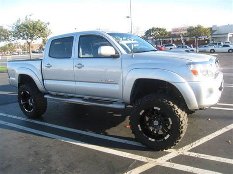 My tacoma with tires,nitto's mud grapplers,bf goodrich all terrain and ...