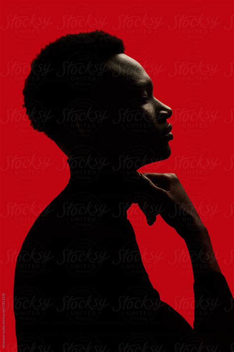 "African American Man Portrait Profile Silhouette Isolated Over Red - Touching The Neck" by ...