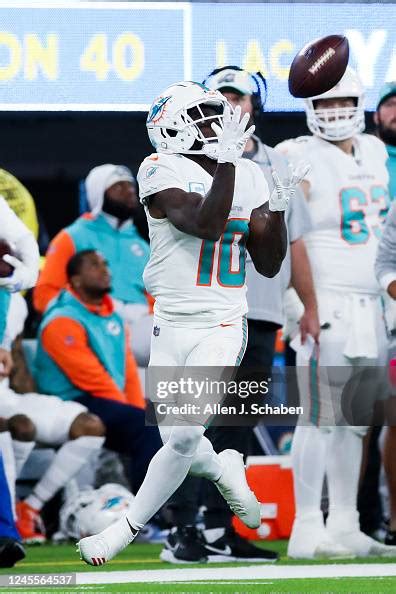 Miami Dolphins wide receiver Tyreek Hill catches a pass for a... News ...