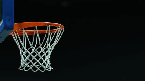 Premium Photo | Basketball hoop on a dark background in a sports complex