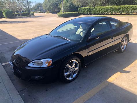 My first car!!! 2002 Dodge Stratus R/T coupe. Bought with under 30,000 miles on it. Hope she ...