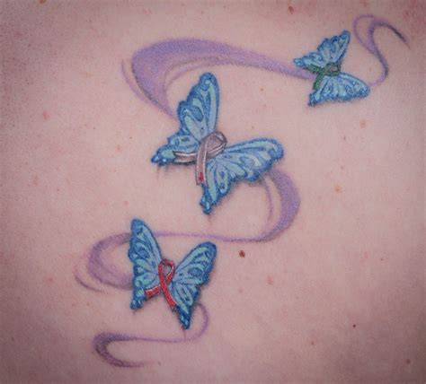 Butterfly And Ribbon Tattoo • Arm Tattoo Sites