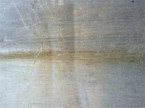 How to Remove 5 Common Concrete Stains - Fluid Concrete